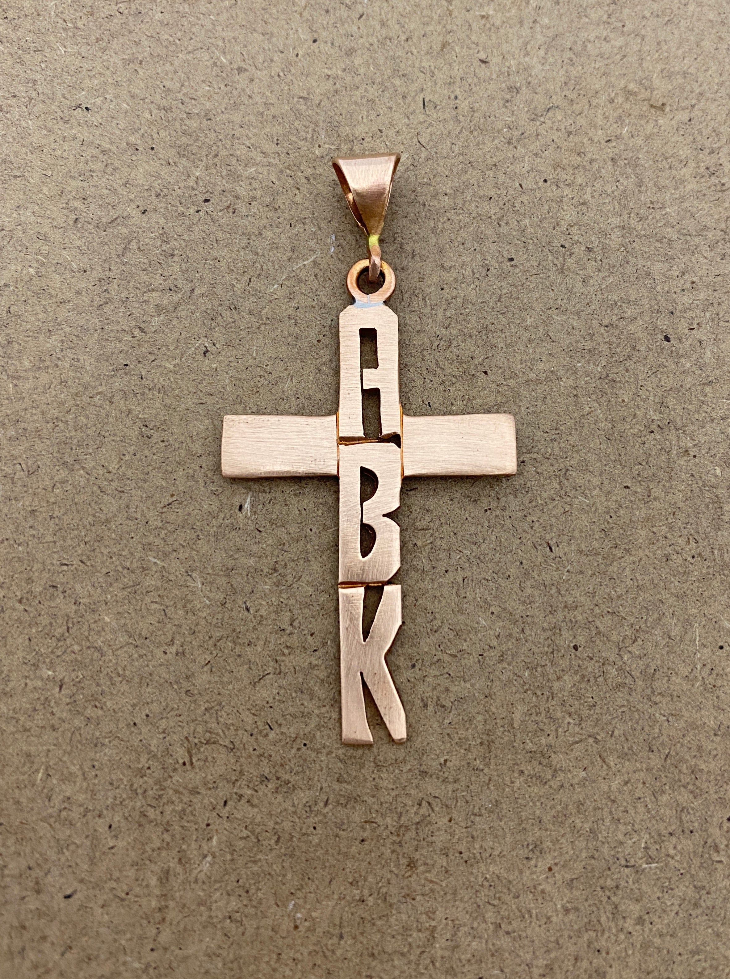 Hand Cut Letters on Cross Necklace