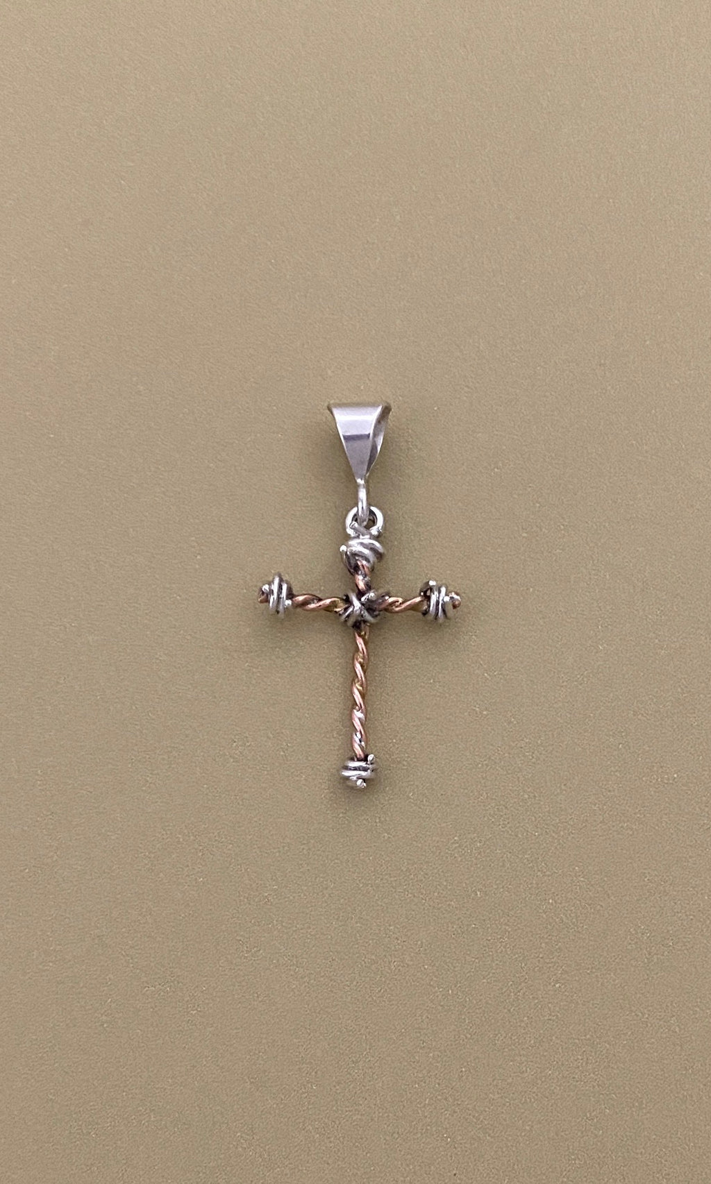 Barbed wire cross pendant in copper