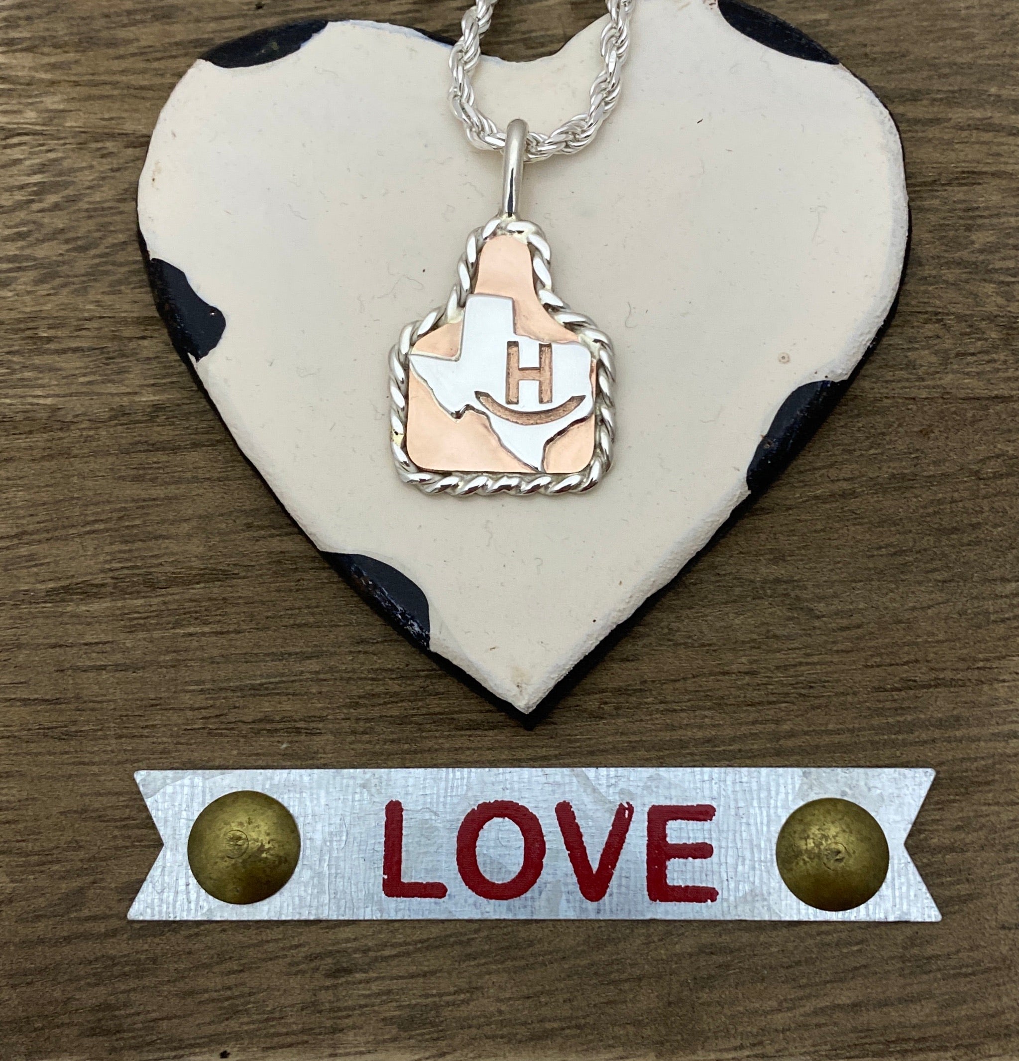 Ear Tags in Copper with Brand in Texas and Sterling Rope Trim