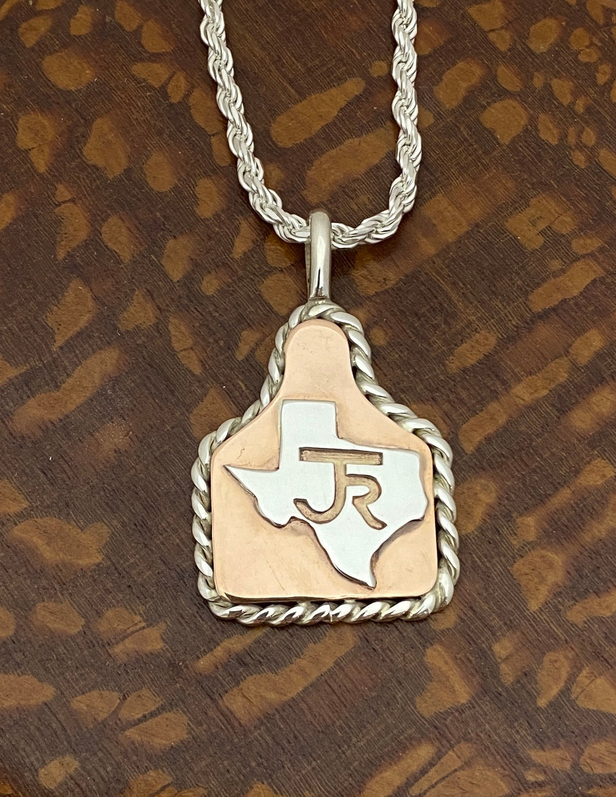 Ear Tags in Copper with Brand in Texas and Sterling Rope Trim