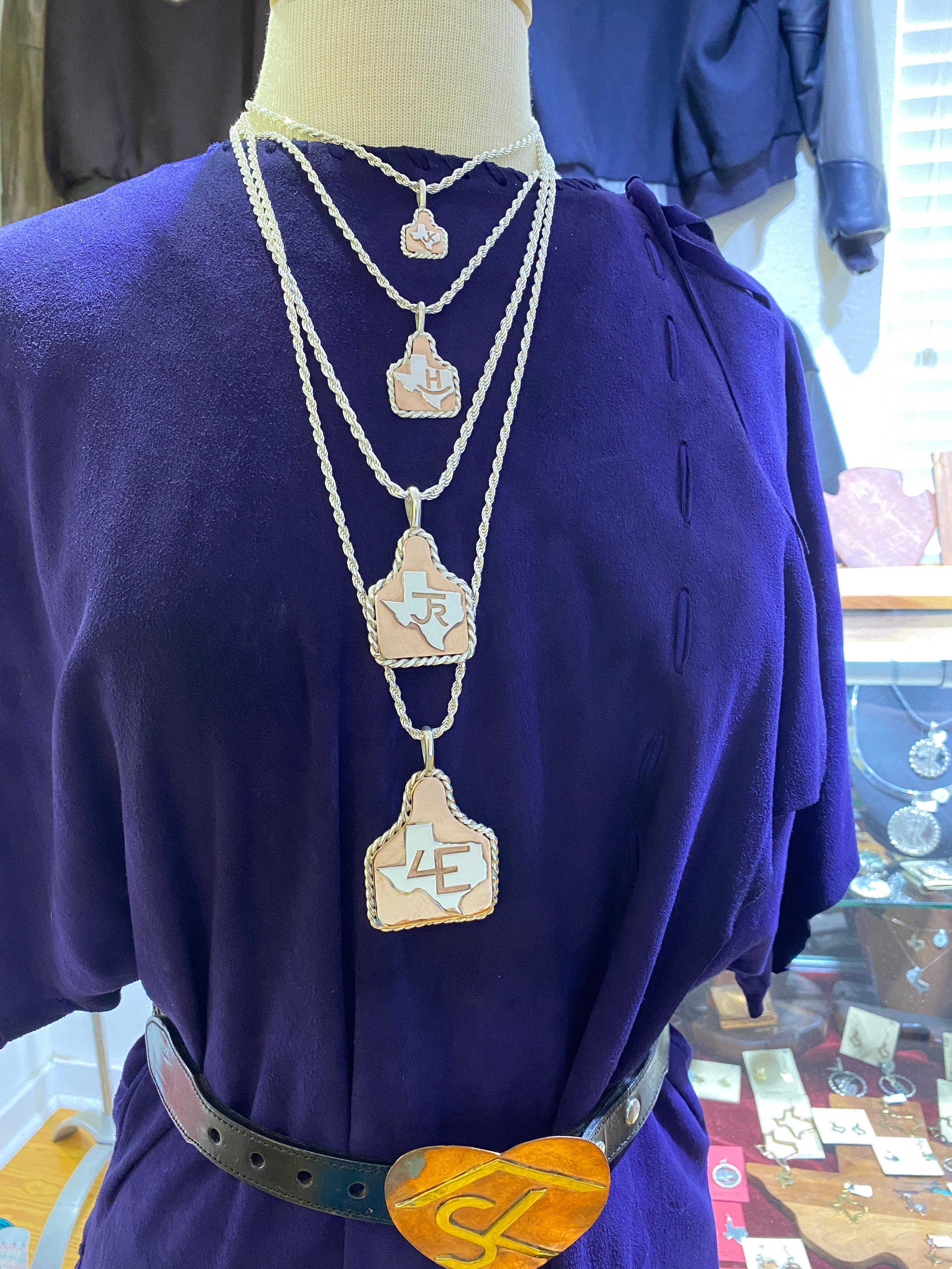 Ear Tags in Copper with Brand in Texas and Sterling Rope Trim