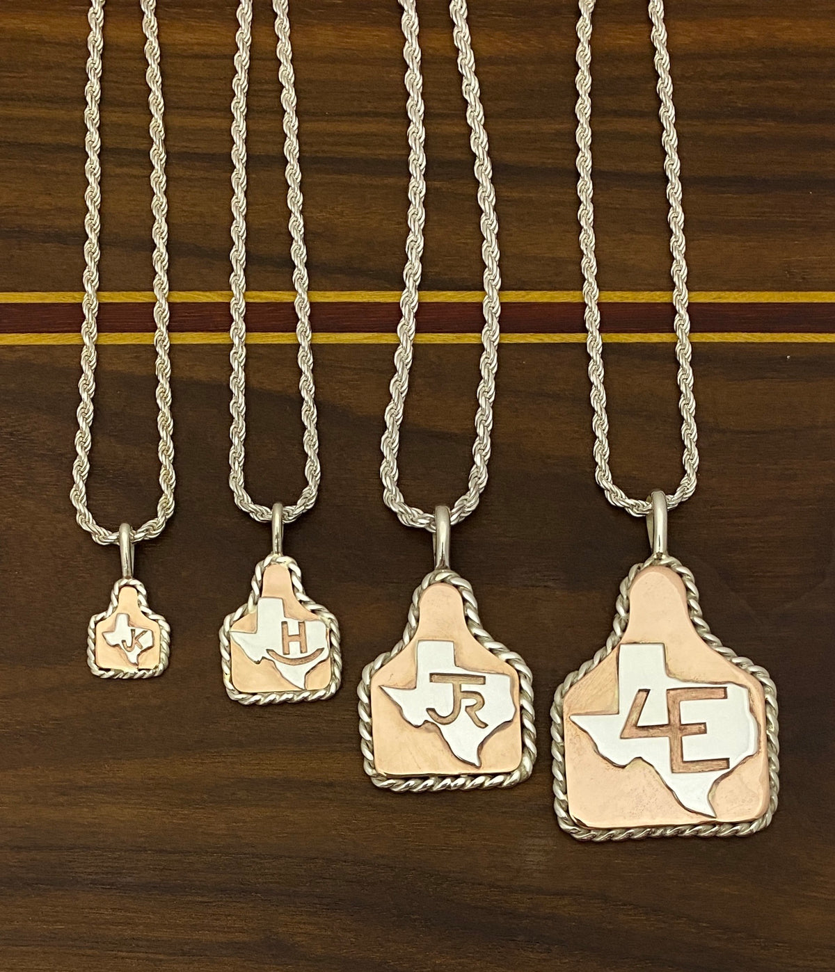 Ear Tags in Copper with Brand in Texas and Sterling Rope Trim