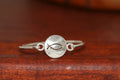Small Christian Fish Disc-Charm on a Bangle Bracelet