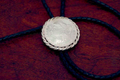 Morgan Silver Dollar with Rope on a Badge/Lapel Pin
