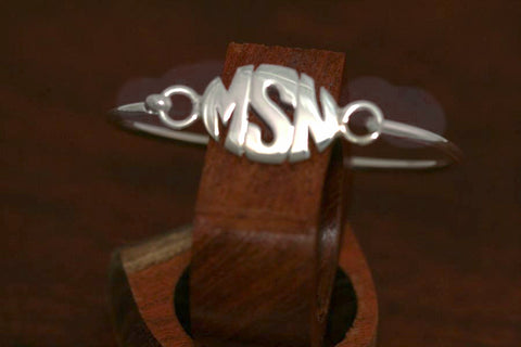 Monogram Oval Disc on a Bangle Bracelet