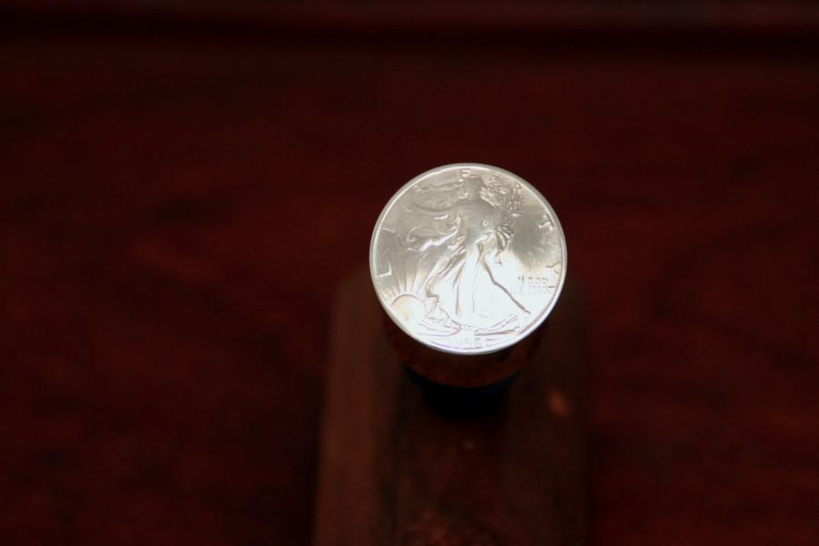 Walking Lady Silver Half Dollar Coin on a Wine Stopper